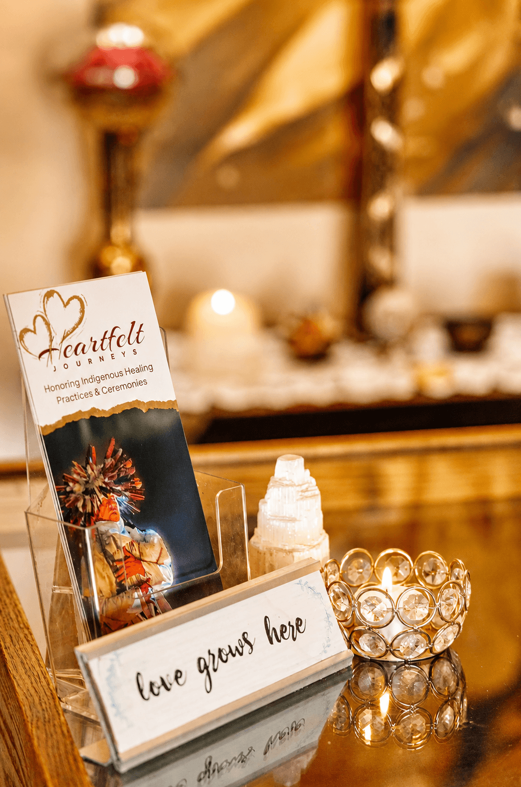 A candlelit corner and a small handwritten reminder of what the Heart Center is really held for